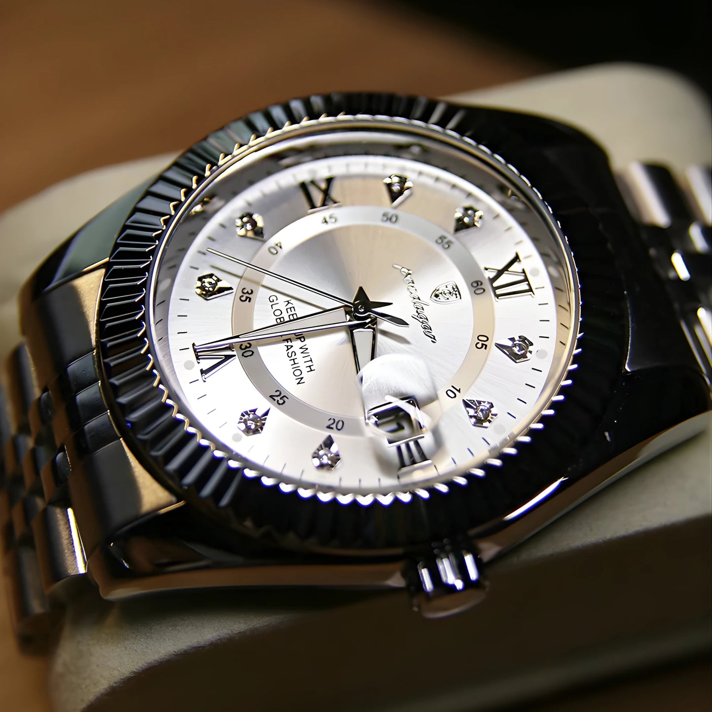 Luxury watch with a skull design on the dial, featuring intricate details.