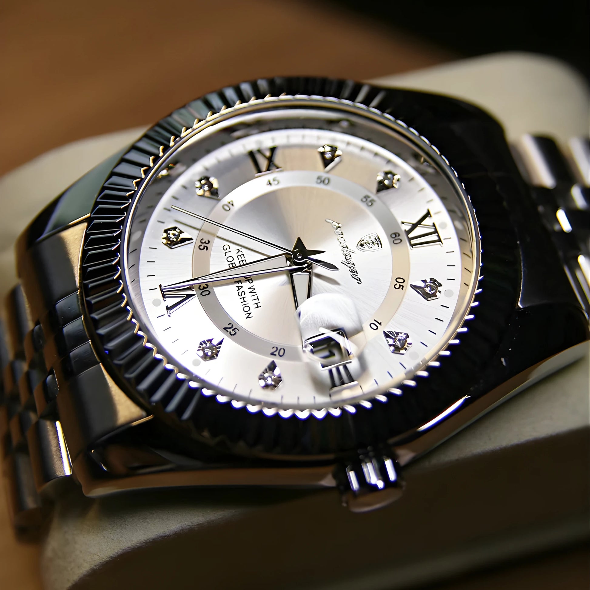 Luxury watch with a skull design on the dial, featuring intricate details.