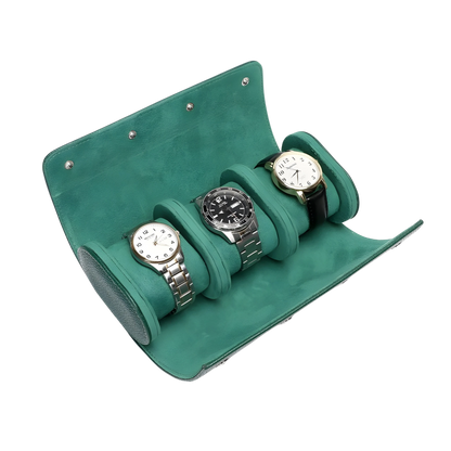 Green watch roll with three watches on a white background